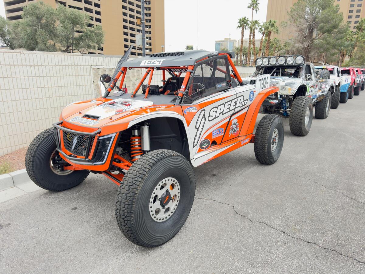 Speed UTV T924 lined up with race vehicles in Las Vegas